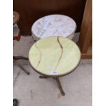 A CIRCULAR COFFEE TABLE WITH MARBLE EFFECT TOP AND A SMALLER TABLE WITH ONYX EFFECT TOP