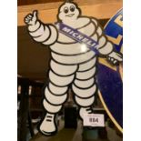 A METAL MICHELIN MAN SIGN FOR A MAN CAVE