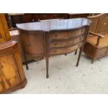 A MAHOGANY SERPENTINE FRONT SIDEBOARD WITH TWO DOORS AND THREE DRAWERS