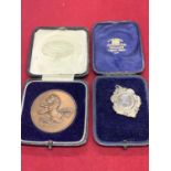 TWO BOXED MEDALLIONS