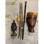 AN ASSORTMENT OF TRIBAL TREEN ITEMS TO INCLUDE AN ANIMAL HIDE DRUM AND A PAIR OF SPEARS ETC