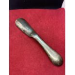 A SHOE HORN WITH ENGRAVING AND MARKED ASK