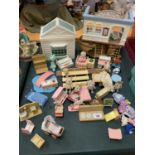 A LARGE COLLECTION OF SYLVANIAN FAMILY ITEMS TO INCLUDE FURNITURE AND A BOAT ETC