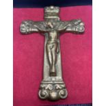 A HEAVY BRASS CRUCIFIX 9 INCHES LONG