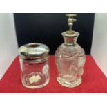 TWO GLASS AND SILVER ITEMS TO INCLUDE AN INDISTINCT HALLMARKED SILVER TOPPED JAR AND A MARKED