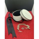 A BOXED SILVER BALLS AND CHAIN BRACELET WITH T BAR CLASP