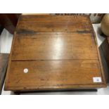 A LARGE VINTAGE WOODEN WRITING SLOPE CONTAINING A LARGE QUANTITY OF ARTIST'S OIL PAINTS, PASTELS ETC
