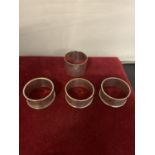 FOUR HALLMARKED BIRMINGHAM SILVER NAPKIN RINGS. THREE MATCHING AND ONE SINGLE