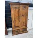 A MEXICAN PINE TWO DOOR WARDROBE WITH SINGLE DRAWER TO THE BASE, 45" WIDE, 75" HIGH