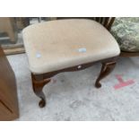 A MDOERN UNIVERSAL UPHOLSTERED STOOL ON CABRIOLE LEGS