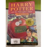 A FIRST EDITION PAPERBACK COPY OF 'HARRY POTTER AND THE PHILOSOPHER'S STONE'