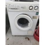 A WHITE ZANUSSI WASHING MACHINE