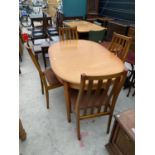 A RETRO TEAK EXTENDING DINING TABLE AND FOUR DINING CHAIRS