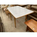 A FORMICA TOP EXTENDING KITCHEN TABLE