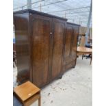 A REPRODUCTION MAHOGANY TWO DOOR WARDROBE BY TIBBENHAM OF IPSWICH AND A SMALLER MATCHING GENTS