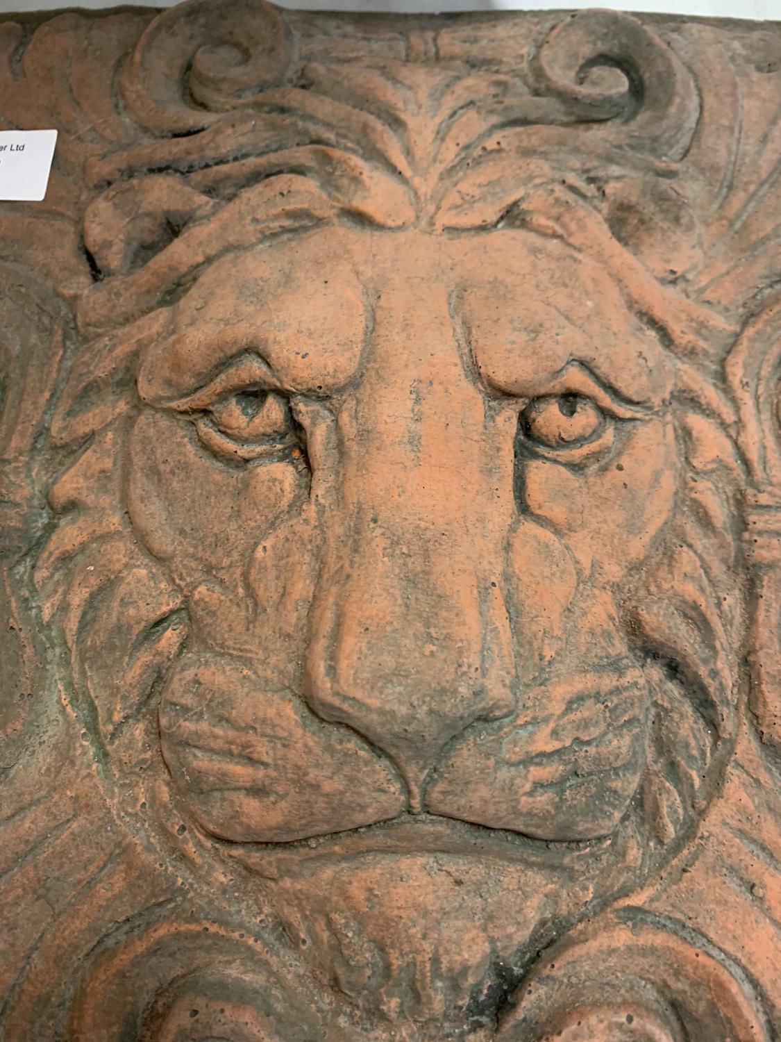 A SQUARE TERRACOTTA STONE TILE OF A LION'S HEAD IN RELIEF - Image 2 of 2