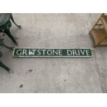 A "GRITSTONE DRIVE" ROAD SIGN