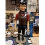 A MODEL OF A YOUNG BOY (HAND A/F) IN WAISTCOAT AND FLAT CAP HEIGHT 95CM