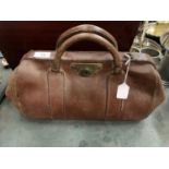 A VINTAGE BROWN LEATHER GLADSTONE BAG