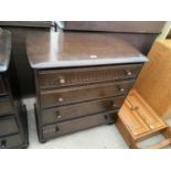 A PRIORY STYLE CHEST OF FOUR DRAWERS