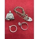 FOUR VARIOUS PIECES OF SILVER TO INCLUDE TWO RINGS, A BIRMINGHAM HALLMARKED BRACELET WITH HEART