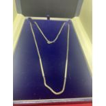 A BOXED 925 SILVER NECKLACE WITH CHAIN AND TUBE DESIGN