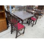 AN EARLY 20TH CENTURY OAK DRAW-LEAF DINING TABLE AND FOUR DINING CHAIRS, WITH BARLEYTWIST LEGS