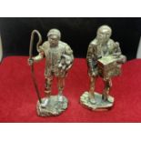 TWO SILVER PLATED FIGURINES DEPICTING A SHEPHERD AND AN ORGAN GRINDER WITH MONKEY