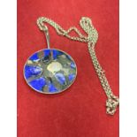 A DANISH SILVER NECKLACE WITH A LARGE BLUE ABSTRACT DESIGN FOB