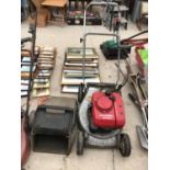 A PETROL HONDA HR1950 EASY START LAWN MOWER