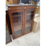 A VICTORIAN MAHOGANY BOOKCASE TOP WITH TWO ARCHED AND GLAZED DOORS WITH AMBER GLASS KNOBS, 42" WIDE