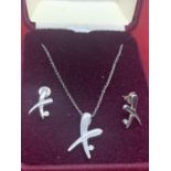 A BOXED 925 SILVER AND DIAMOND NECKLACE AND MATCHING EARRING SET