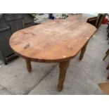 A PINE DINING TABLE