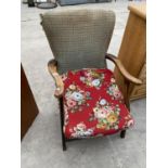 A PARKER KNOLL STYLE FIRESIDE CHAIR