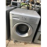 A SILVER BEKO 8KG WASHING MACHINE BELIEVED IN WORKING ORDER BUT NO WARRANTY