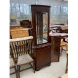 A MAHOGANY CORNER CABINET WITH LOWER DOOR AND UPPER GLAZED DOOR