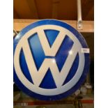 A METAL VOLKSWAGEN MAN CAVE SIGN