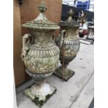 AN IMPRESSIVE ORNATE PAIR OF RECONSTITUTED STONE MID 20TH CENTURY GARDEN URNS MEASURING ONE METER 58