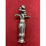 A DECORATIVE DUTCH SILVER CORKSCREW DEPICTING A BOY WITH A GOBLET