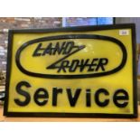 A 'LAND ROVER SERVICE' ILLUMINATED LIGHT BOX ADVERTISING SIGN