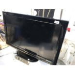 A 32 " PANASONIC TELEVISION WITH REMOTE CONTROL