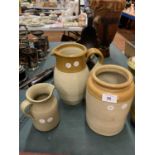TWO LARGE BROWN AND GREY STONE WARE POTS AND ONE SMALLER GREY JUG