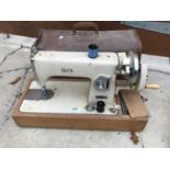 A VINTAGE ALFA CASED SEWING MACHINE