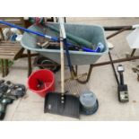 A WHEELBARROW AND VARIOUS GARDEN TOOLS