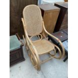 A MODERN BENTWOOD ROCKER WITH SPLIT CANE SEAT AND BACK