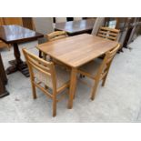 AN OAK DINING TABLE AND FOUR DINING CHAIRS