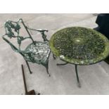 A METAL GARDEN TABLE AND CHAIR