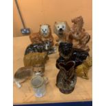 NINE CERAMIC ITEMS SOME STAFFORDSHIRE TO INCLUDE A HORSE, HIGHLAND COW, CATS, LION ETC THE LOTS