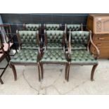 A SET OF SIX REGENCY STYLE SABRE LEG DINING CHAIRS WITH BUTTON-BACKS AND SEATS (TWO CARVERS)