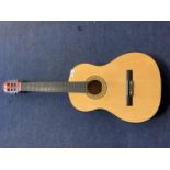 AN ARTISAN ACOUSTIC GUITAR